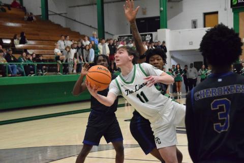 Senior Bentley Huff puts up a shot in Franklin County’s round one win over Kendrick last week in the Lions Den. (Photo by Shane Scoggins)