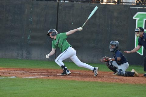 Hudson Huff follows through after one of his three hits – including a leadoff home run – Monday in a Franklin County Lion win over No. 5-ranked Redan in Carnesville. (Photo by Shane Scoggins)