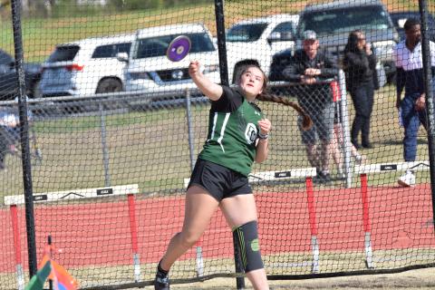 Carly Tanner makes  a throw in the discus event at the NEGIAA Region Championship Tuesday in Danielsville. Tanner won the discus and shot put to help lead the Lady Cubs to a region championship. (Photo by Shane Scoggins)