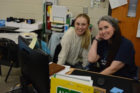 FCHS teacher Brandie Thomas consults with student Charlize Smith during her physical science class. Thomes is one of about one million Americans diagnosed with multiple sclerosis (MS). She is sponsoring a fundraising Walk for MS on March 14 at Ed Bryant Stadium. The money raised will go to the National MS Society, which funds research to find a cure. (Photo by Charlie Eavenson)