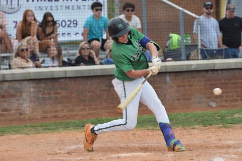 Hudson Huff swings at a pitch during the Lions' first round baseball playoff game against Union County in Blairsville.