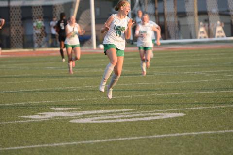 Mckenna Roberts (left photo) celebrates after her goal Friday against the Hart County Lady Bulldogs in Hartwell.
