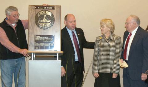 Anderson Dilworth (far right) was presented the City of Royston’s Excelsior Award, the city’s Hall of Fame designation, in 2013, in a ceremony overseen by then-Mayor David Jordan (center). Also pictured are former City Council Member Larry Bowen (left) and Dilworth’s wife, Joel.