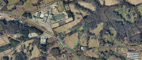 The Franklin County Board of Education voted Thursday to buy 21.54 acres to add to the campus at FCHS. 