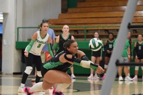 Senior Kallie Thrift digs a ball Tuesday in action against Rabun County in the Lion’s Den. Thrift and the Lady Lions swept Rabun and East Jackson in the three-team match. (Photo by Shane Scoggins)