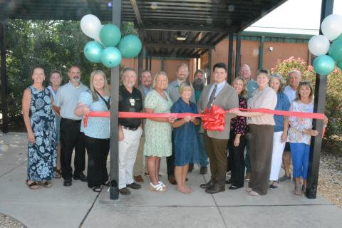 The Franklin Campus of Mountain Education Charter High School held a ribbon cutting and open house for its new location on the campus of Franklin County High School on Monday. The Franklin County Chamber of Commerce assisted with the celebration. Those attending were (from left) Rachel Howington, Claudette Gillespie, Scott Rhinehart, Brooke Dove, Darren Sledge, Steve Bartlett, Lydia Bennett, Dr. Joe Cash, Melanie Burton-Brown, Benjamin Khodadadi, Dr. Andrew Fowler, Dr. Kaila Steele, Bruce Brown, Dr. Kellie 
