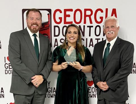 Lavonia Mayor Courtney Umbehant (left), Downtown Development Director Ashley Rose Umbehant (center) and City Manager Robert Ogburn (right) accepted the Outstanding Downtown Promotion Award during the Georgia Downtown Conference in Rome last week. (Photo courtesy of the City of Lavonia)