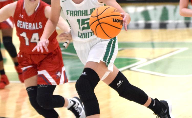 Lady Lion Emily Carson drives into the lane during action Friday in the Bearden Border Wars tournament at FCHS.