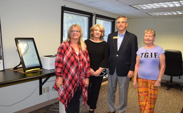Georgia Secretary of State Brad Raffensperger (second from right) meets with Franklin County Board of Elections members Angela Whidby (left) and Alice Black (right) and Elections Supervisor Gina Kesler. Raffensperger was in town to meet with officials about the state’s new election system that will be used next year. (Photo by Scoggins)