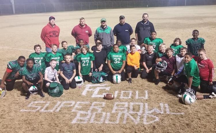 Franklin County Lions 10-and-Under team members are Kolson Howell, Gavin Wells, Aiden Westmoreland, Essien Lockleer, Josh Baughcum, Kade Gentry, Kewonta Riley, Hunter Barnes, C.J. Davis, Rayan Wilson, Kennan Burtch, Jeromyah Knox, Janareon Riley, Carson Cheek, Colton Milsaps, Blake Abercrombie, Kendaus Burtch, Josiah Jackson, Sihon Wigfall, Myles Kelley, Gage Bryant, Hunter Blackmon, Crate Phillips, Connor Fuhrman, Eli Bridges and Alijah Kibler.  Coaches are Jeremy Barnes, Brian Scott, Aaron Kibler, Brent H