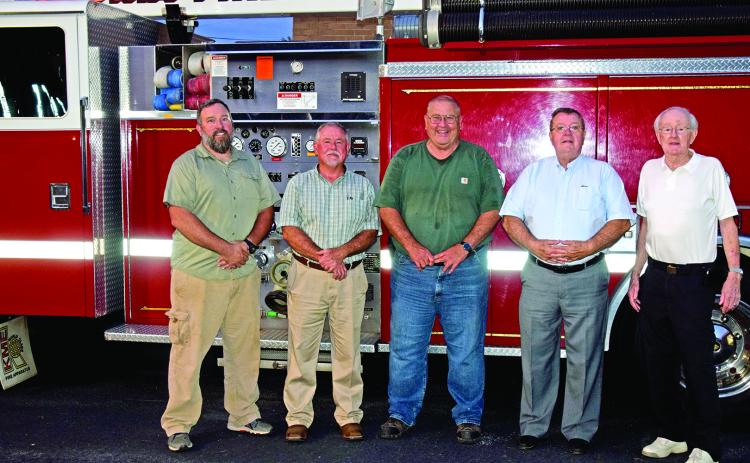 Former Lavonia Fire Chiefs gathered Tuesday to honor the retiring Scott O'Barr. Pictured are (from left) O’Barr, Bob White, Jones Beasley, Mike O’Barr and Tommy Cole. (Photo by Scoggins)