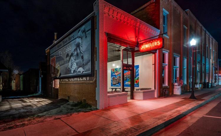 The former McCall Jewelers building in downtown Royston is now known as “The Gem,” an outdoor dining area for The Old Corner Hardware Store. Owner Kelley Tamplin refurbished the building to include picnic tables for those wishing to eat outside and commissioned a mural by her son Reed as part of an effort to make Royston a destination place for young people and couples. For complete details, see our Business Honor Roll on Pages 5-8A. (Photo courtesy of Kelley Tamplin)