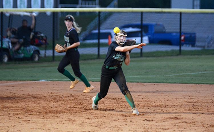 Journey Roberts makes a throw to first base during Franklin County’s home game with Habersham Central Monday in Carnesville. (Photo by Scoggins)