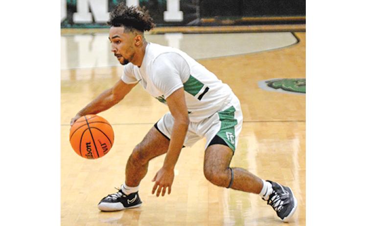 Senior Keez Roebuck looks for an opening to drive Friday in a contest against Rabun County.