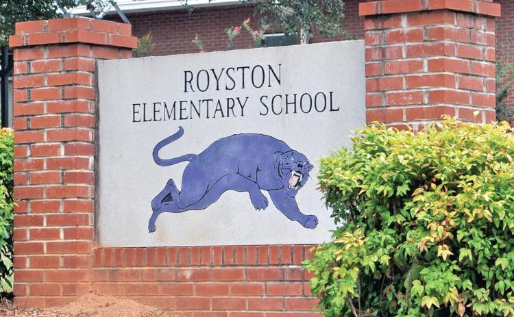 The board adopted a resolution Tuesday for a $21.7 million bond to build a new elementary school to replace the aging Royston Elementary School.