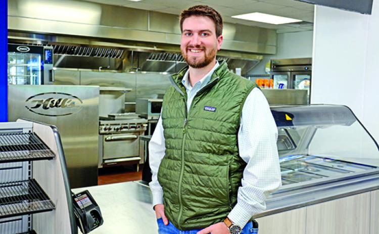 Matt Hill stands in front of Hill’s Exxon’s new state-of-the-art kitchen which will be the hub for full breakfast and lunch service in the next couple of weeks. (Photo by Scoggins)
