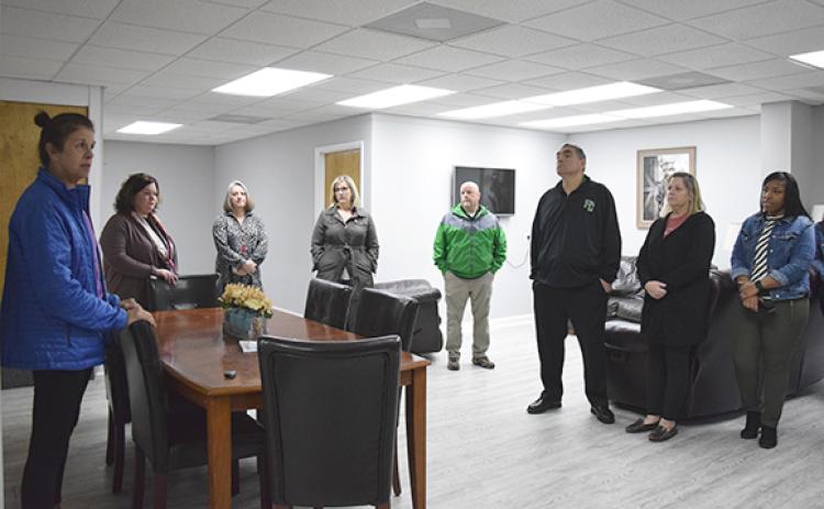 Franklin County School System leaders listen as Jean Davison shares information about Connection for Special Parents. (Photo by Sinclair)
