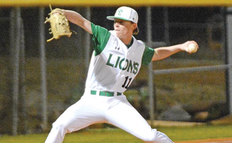 Miles Dodd delivers a pitch in a victory over Madison County Thursday in Carnesville. (Photo by Scoggins)