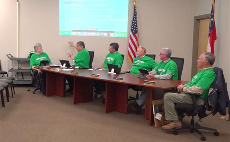 At the March 8 meeting, Superintendent Chris Forrer explains to school board members that city leaders can approve developments independently from the county.