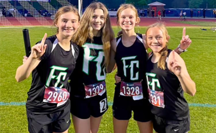 The girls’ 4x400 relay team (right photo, from left)  Mia Patterson, Savannah Jackson, Megan Hightower and Willow Morgan set the school record at the state championships.