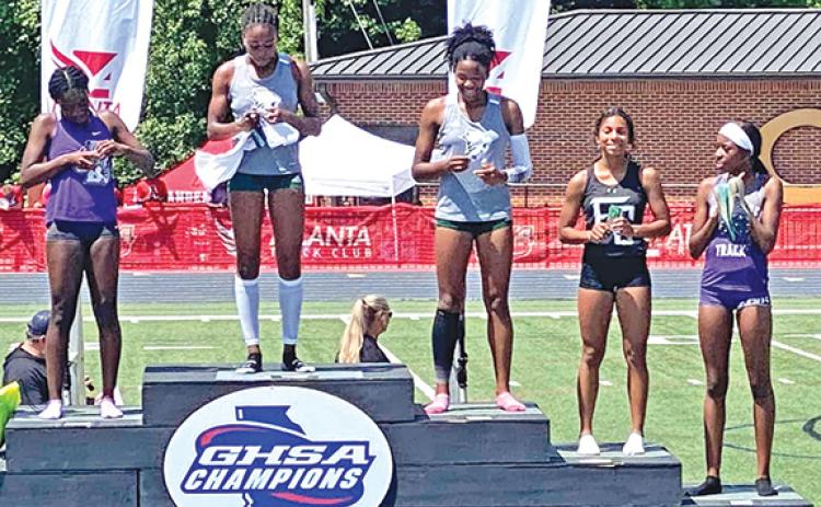 Franklin County Lady Lion hurdler Lexi Knox (far right) finished on the podium twice at the State Track Championships. Knox was fifth in the 100 meter hurdles and eight in the 300 meter hurdles. (Photo courtesy of Franklin County Track)