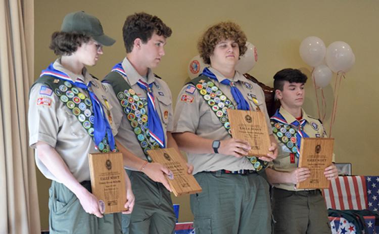 Scout Troop No. 51 members (clockwise from top left) Connor McDuffie, Jaden Willette, J.T. Strickland and Duncan McDuffie received their Eagle Scout awards during a ceremony May 21 at Lavonia First United Methodist Church. (Photos by Scoggins)