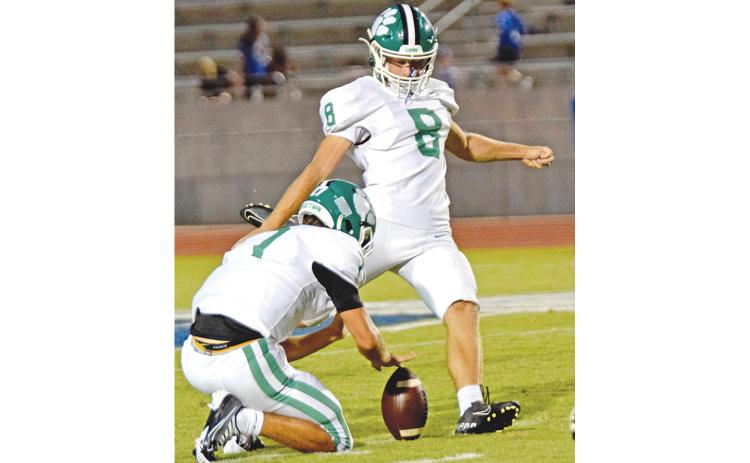 Franklin County High School senior kicker Jonathan Duncan (No. 8) set a school record with a 50-yard field goal during Friday’s FCHS football game at Pickens, S.C. Duncan’s kick out of the hold of Dee Oliver gave the Lions a 10-0 lead in the game. He also made two extra points in the contest, which Franklin eventually lost 42-17. (Photo by Scoggins)