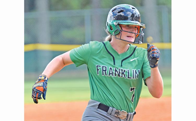 Journey Roberts heads toward the plate during action Saturday against Lanier in a tournament held in Winder. (Photo by Scoggins)