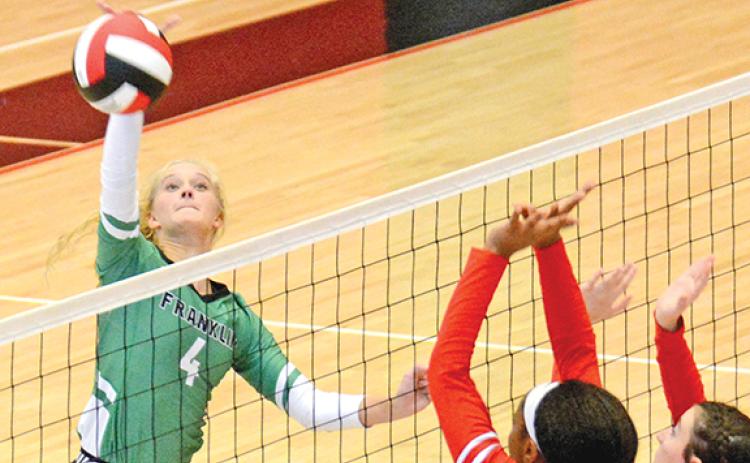 Jordis Haselden spikes a ball in action against Stephens County last season.