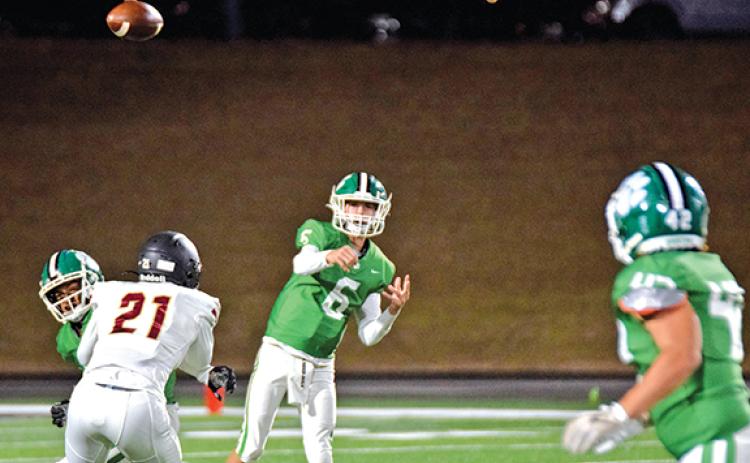 The Franklin County Lions moved to freshman Mason Davis at quarterback during Friday’s game with Hebron Christian in order to begin giving Davis experience for future seasons. (Photo by Scoggins)