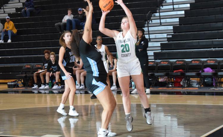 Journey Roberts puts up a shot in tournament action Tuesday against Daniel, S.C. (Photos by Scoggins)