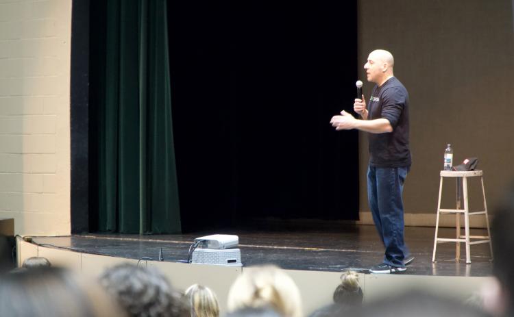 Speaker Kevin Hines told Franklin County High School students and parents Tuesday of his suicide attempt by jumping off the Golden Gate Bridge, how he has learned to deal with mental health issues and gave tips for those facing similar issues. (Photo by Raese)