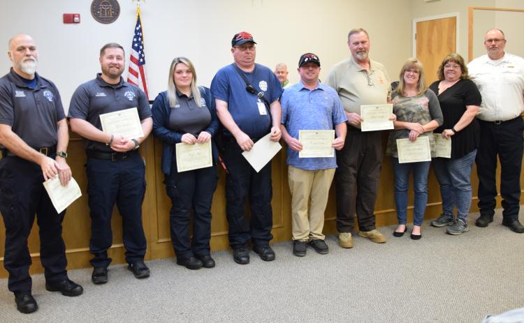 Franklin County emergency responders EMTs Jim Crisp, Teryn Mize and Tyler Lanier; First Responders Curtis Ream and Ricky Maddox of the Gumlog Fire Department; Franklin County Sheriff’s Deputy Mitch Murphy; and dispatchers Teresa Boudway and Donna Maisonett were recognized by EMS Director Terry Harris Tuesday for their life-saving efforts for a patient in September. (Photos by Scoggins)