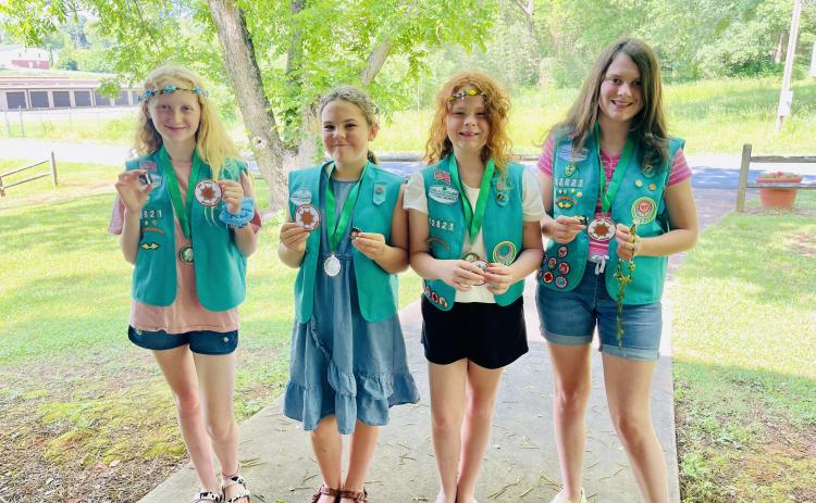 Junior Girl Scouts from Carnesville Troop 12821 (from left) Kenzie McDuffie, Rachel Burger, Brooke Graham and McKinley Goss earned the Bronze Award, the highest award available at the Junior level of Girl Scouting.