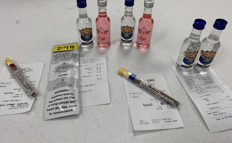 A teenager working with the Lavonia Police Department was able to buy mini-bottles of vodka and cigars at five Lavonia stores without having to show ID.