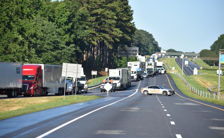 Both northbound lanes of I-85 near Exit 177 outside Lavonia were closed during the height of the Monday morning rush hour for an extended period of time for clean-up efforts and an investigation of a fatal accident. (Photos courtesy of Dawson Baker at The Hartwell Sun)