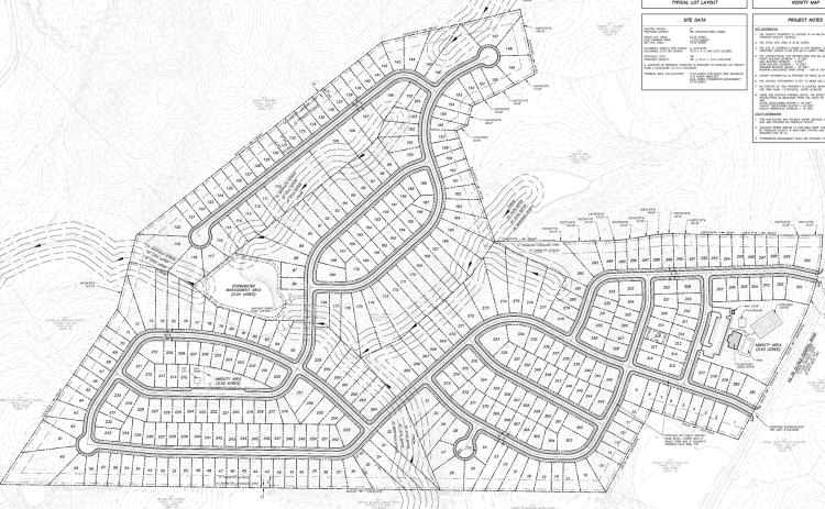 Franklin County commissioners voted Monday to settle a lawsuit with developers who wanted to build a townhome development near Exit 160 on I-85.