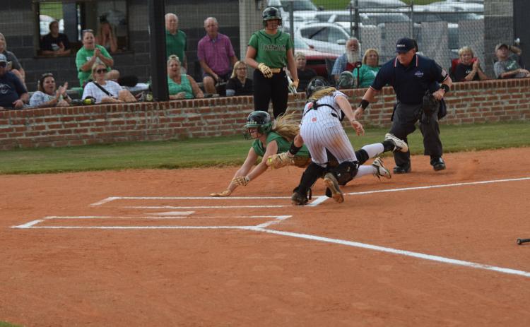 Lenox Roberts is tagged out while flying toward home plate against Hart County Thursday in Hartwell. (Photo by Scoggins)