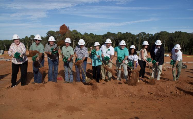 Members of the Franklin County Board of Education, school system administrators and contractors officially break ground Monday on the new South Franklin Elementary School. (Photos by Raese)