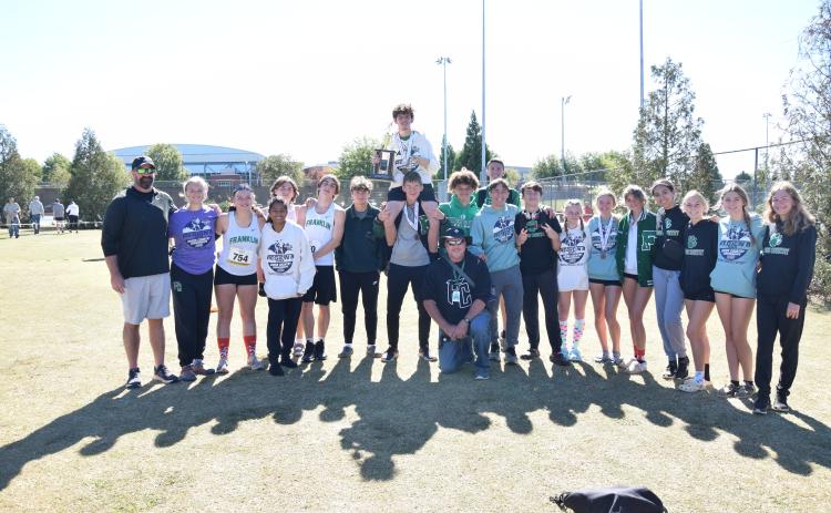 The Franklin County Lion and Lady Lion cross country teams each qualified for state after their finishes at the Region 8AAA meet Saturday in Bogart. (Photo by Scoggins)
