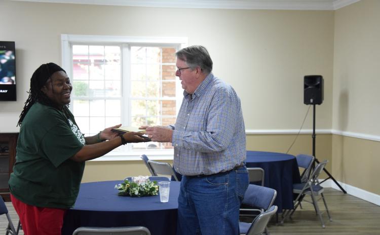 The City of Carnesville held a luncheon reception Thursday to honor Mayor Harris Little and Council Member Sid Ginn, each of whom will be retiring from the city at the end of the year.