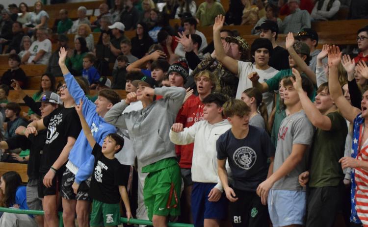 The Franklin County Lions and Lady Lions swept rival Stephens County Friday night in an electric atmosphere in the Lion’s Den. The boys won 59-55 in overtime, while the girls won 63-49