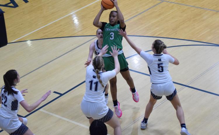 Takiaha Winkfield goes up for a shot against White County Friday in the second round of the state tournament in Cleveland. (Photo by Scoggins)