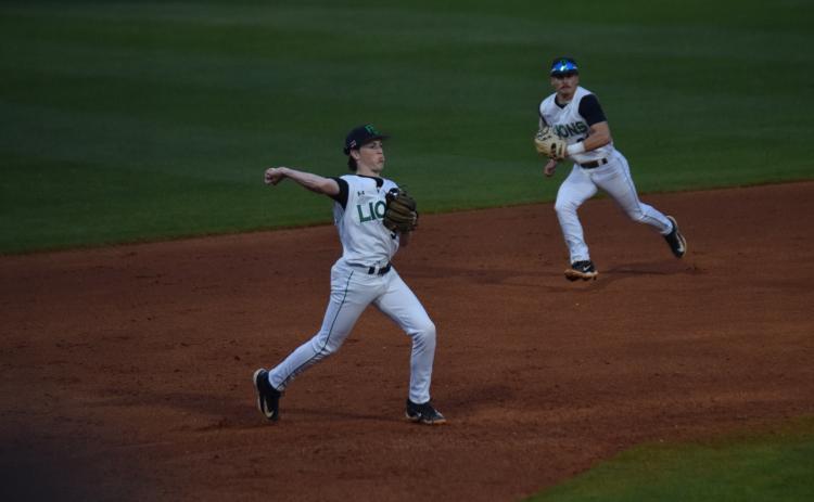 Luke Beasley makes a throw from third in action earlier this season.