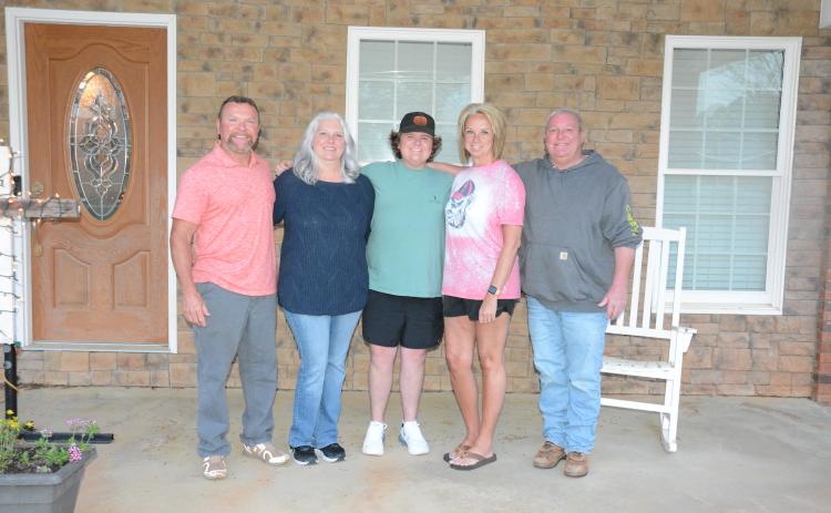 Donors Dusty Morgan and Karen Colwell stand with kidney recipient Mason Kelley and parents Tammy and Brian. (Photo by Eavenson)
