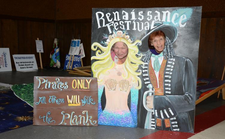 Linda Poss (left) and Vivian Young (right) have been working with others to build and paint decorations for Saturday’s Lavonia Renaissance Festival, which has a “PIrates and Mermaids” theme this year. (Photo by Eavenson)