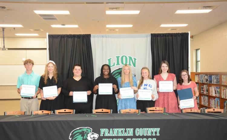 Members of Georgia Future Educators signed certificates Tuesday indicating their intention to teach school in Georgia. Pictured during the signing ceremony in the Franklin County High School media center were (from left) Landon Floyd, Ryleigh Segars, Gwen Noel, Saniya Heard, Savanna Hart, Lealy Day, Helena Burton and Caitlin Buffington. (Photo by Eavenson)