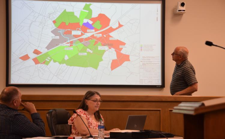 Sewer service will be expanded at Exit 160 on I-85, but not as much as members of Franklin County’s development board requested.