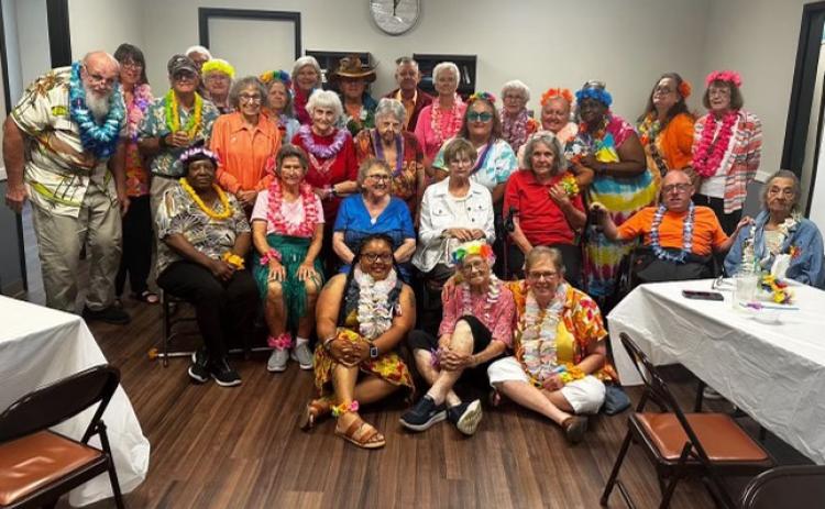 Participants and staff members of the Franklin County Senior Center traveled June 19 to the Hart County Senior Center for a joint Hawaiian-style luau.