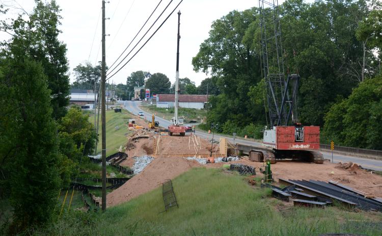 Work is under way on a bridge replacement on Highway 59 in the middle of Carnesville. (Photo by Eavenson)